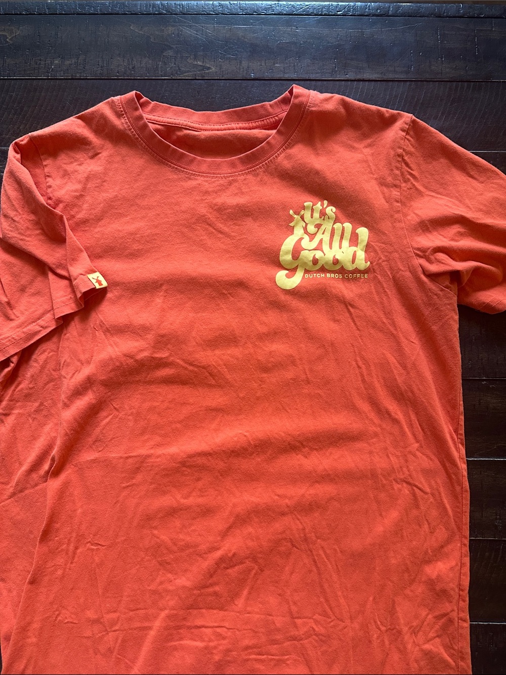 Dutch Bros Orange Tee with Yellow Script Logo